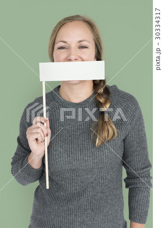 Caucasian Woman Holding Flag Covering Mouth 30334317