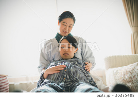woman during pregnancy or shortly after childbirth 30335488