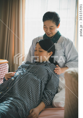 Woman During Pregnancy Or Shortly After Childbirthの写真素材