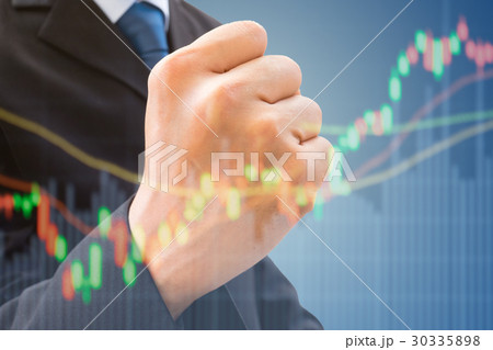 Businessman raising his fist of successful 30335898