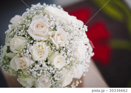 Wedding bouquet in hands of the bride. 30336662