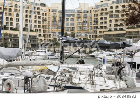 Sailboats and yachts moored at Portomaso Marina 30348832