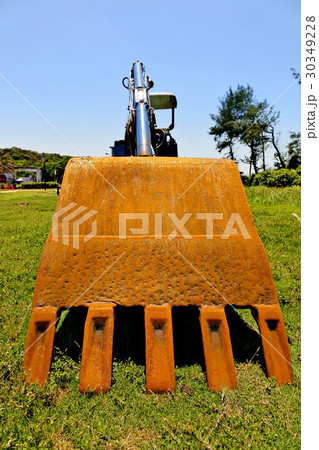 Digging buckets at construction site 30349228