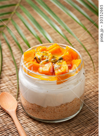cheesecake in a  jar with mango and passionfruit 30352665