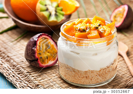 cheesecake in a  jar with mango and passionfruit 30352667