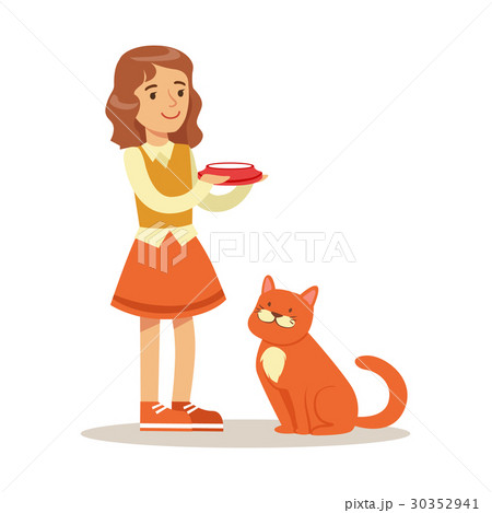 Cute little girl holding a bowl with milk and red 30352941