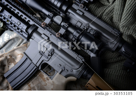 American machine gun in army background . 30353105