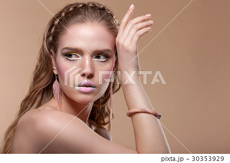 Portrait of a young woman with creative make-up 30353929