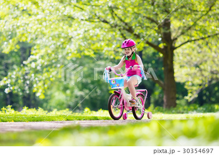 child riding bicycle