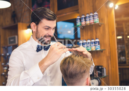 Young Man in Barber Shop Hair Care Service Concept Young Man in Barber Shop Hair Care Service Concept 30355028
