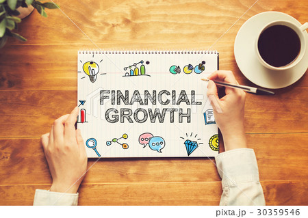 Financial Growth text with a person holding a pen 30359546