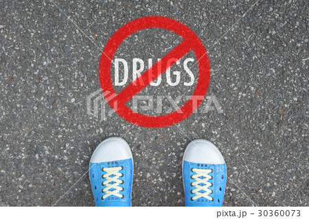 Teenager standing at NO DRUGS ZONE Teenager standing at NO DRUGS ZONE 30360073