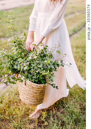 people, holidays and nature concept - young woman 30360374