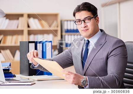 Businessman receiving letter in the office Businessman receiving letter in the office 30360836