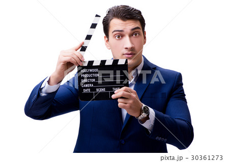 Handsome man with movie clapper isolated on white 30361273