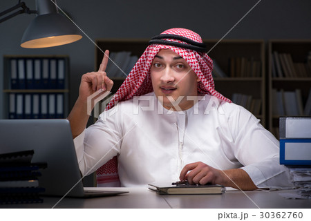 Arab businessman working late in office 30362760