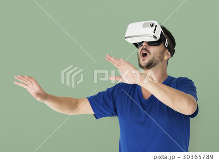 A man using a visualiaing reality gadget 30365789