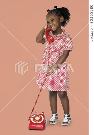 Little Girl Smiling Happiness Talking on the Phone Communication Little Girl Smiling Happiness Talking on the Phone Communication 30365980