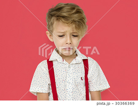 写真素材: Little Boy Frowning Sad Cry