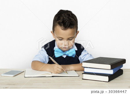 A Caucasian Boy Studying Writing Background Studio Portrait A Caucasian Boy Studying Writing Background Studio Portrait 30366447