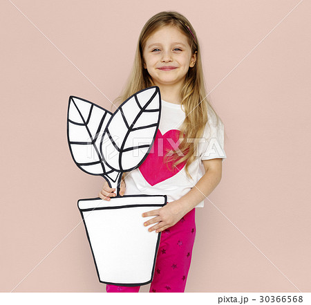 Little Girl Holding Papercraft Plant Smiling Little Girl Holding Papercraft Plant Smiling 30366568