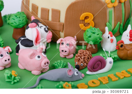 birthday cake with farm marzipan animals 30369721