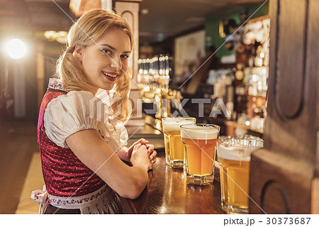 Outgoing woman having job in alehouse 30373687