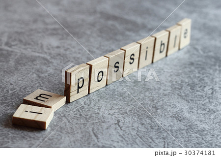 Possible word written on wood cube 30374181