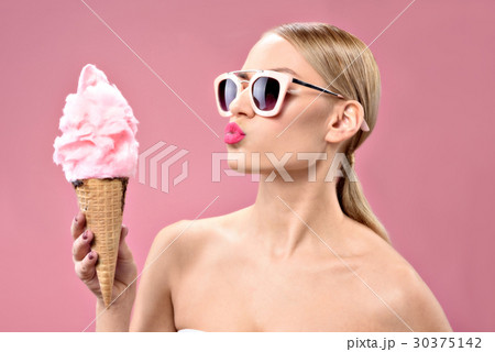 Cute woman making air kiss Cute woman making air kiss 30375142