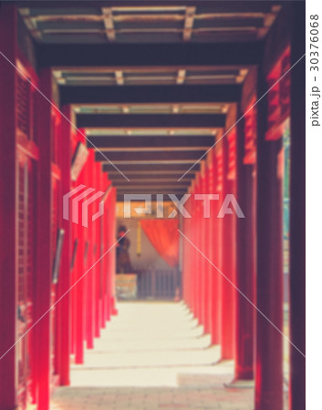 Blurred image of arcade corridor in Chinese temple Blurred image of arcade corridor in Chinese temple 30376068