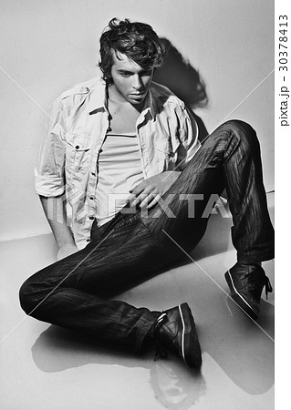 Portrait of a posing male model 30378413