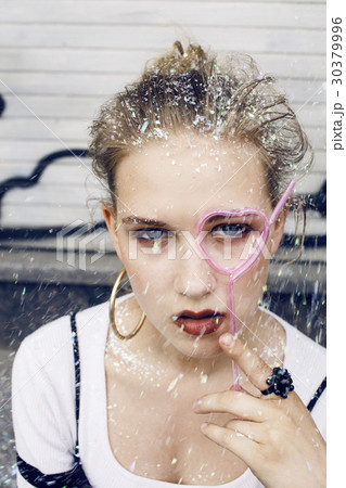 young pretty party girl smiling covered with 30379996