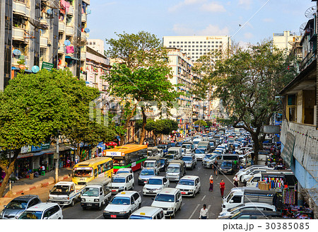 Cars on main street in Yangon, Myanmar 30385085