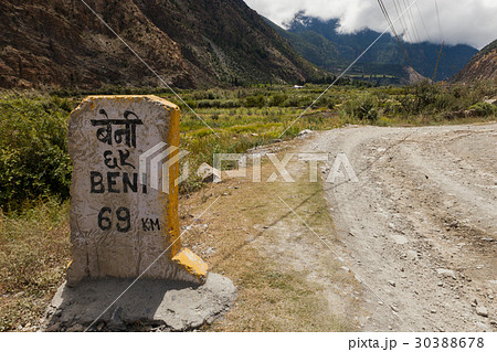 Milestone near the road in annapurna area, Nepal. 30388678