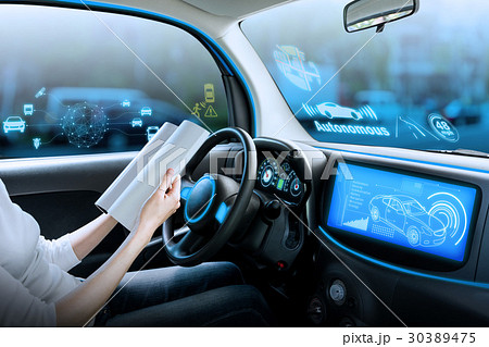 自動運転車の運転席の写真素材