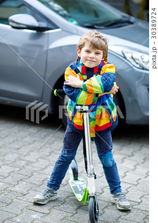 Active school kid boy in colorful casual clothes 30389724