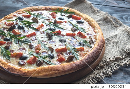 Cooked pizza Cooked pizza 30390254