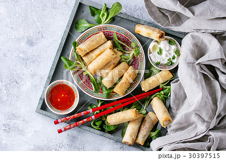 Fried spring rolls with sauce Fried spring rolls with sauce 30397515