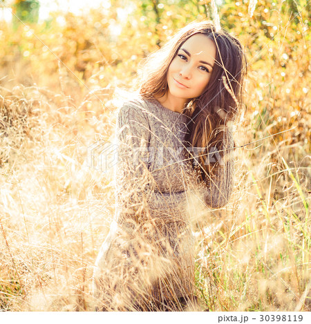 Beautiful lady in atmospheric landscape Beautiful lady in atmospheric landscape 30398119