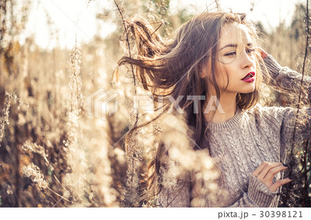 Fashion beautiful lady in autumn landscape Fashion beautiful lady in autumn landscape 30398121