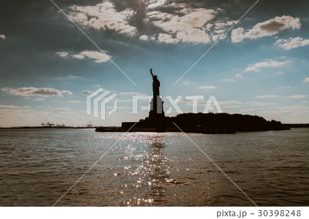 The silhouette Statue of Liberty in New York City The silhouette Statue of Liberty in New York City 30398248