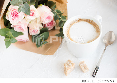 Romantic feminine background with coffee and roses Romantic feminine background with coffee and roses 30399253