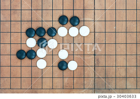 basic joseki in conner on go game board 30403633