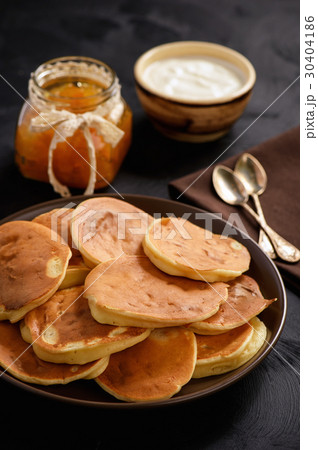 Homemade pancakes on black background. 30404186