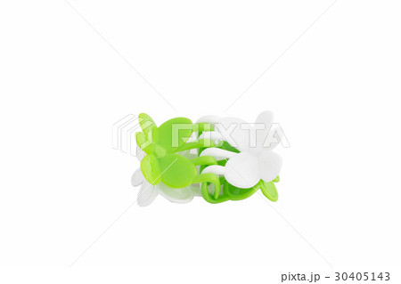 Green hairpin on white background 30405143