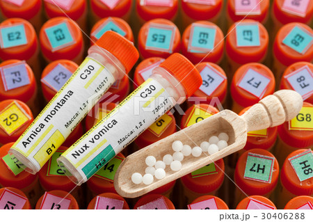 Tubes of homeopathy globules and scoop Tubes of homeopathy globules and scoop 30406288