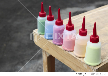 Colorful sand in plastic bottle for sand painting Colorful sand in plastic bottle for sand painting 30406469