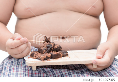 nama chocolate on obese boy hand isolated nama chocolate on obese boy hand isolated 30407565
