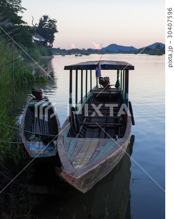 Two boats in river at twilight 30407596