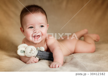 Portrait of newborn baby is lying on the blanket 30412382